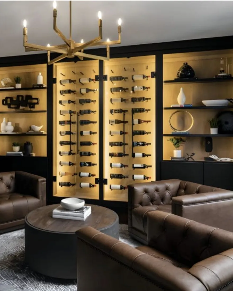 Wine room with backlit display cabinetry